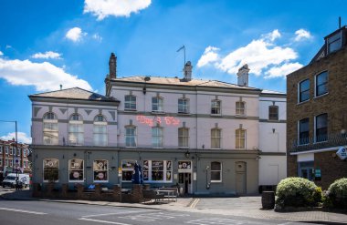 London, UK, July 2022, view of the Dog and Fox, a pub and hotel in Wimbledon Village high street