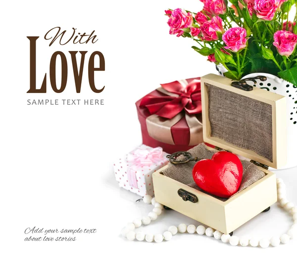 Red heart wooden casket with bunch roses — Stock Photo, Image