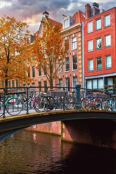Bridge over channel in Amsterdam Netherlands houses river Amstel — Stock Photo, Image
