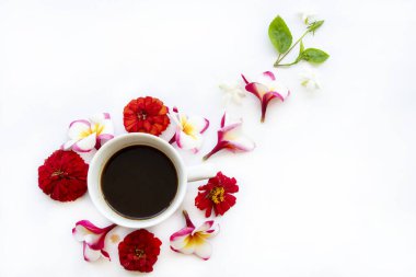 hot coffee espresso with colorful flowers  arrangement flat lay postcard style on background white
