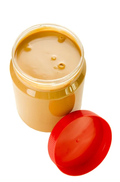 Open jar of peanut butter — Stock Photo, Image