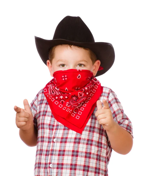 Kind verkleidet als Cowboy spielt isoliert auf Weiß — Stockfoto