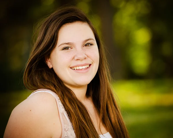 Portrait of happy teenage or adolescent girl outdoors — Stock Photo, Image