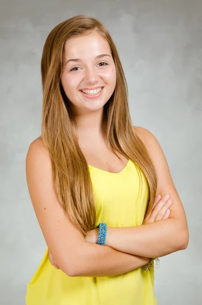 Studio portrait of happy pretty, teen girl smiling — Stock Photo, Image