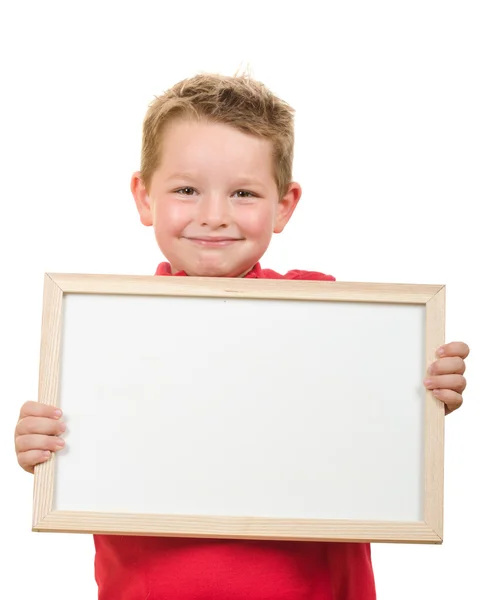 Porträt eines kleinen Jungen mit leerem Schild mit Platz für Ihre Kopie isoliert auf weiß — Stockfoto