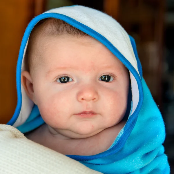 Baby bundled up in towel after bath — Stock Photo, Image