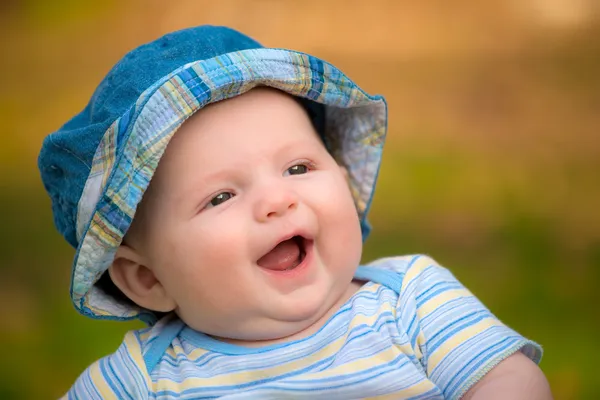 Outdoor portrait of happy smiling infant baby boy — Stock Photo, Image