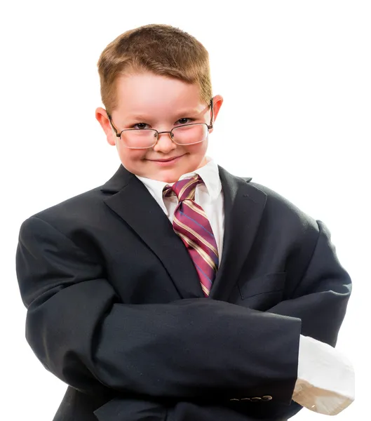 Niño serio usando traje que es demasiado grande para él —  Fotos de Stock