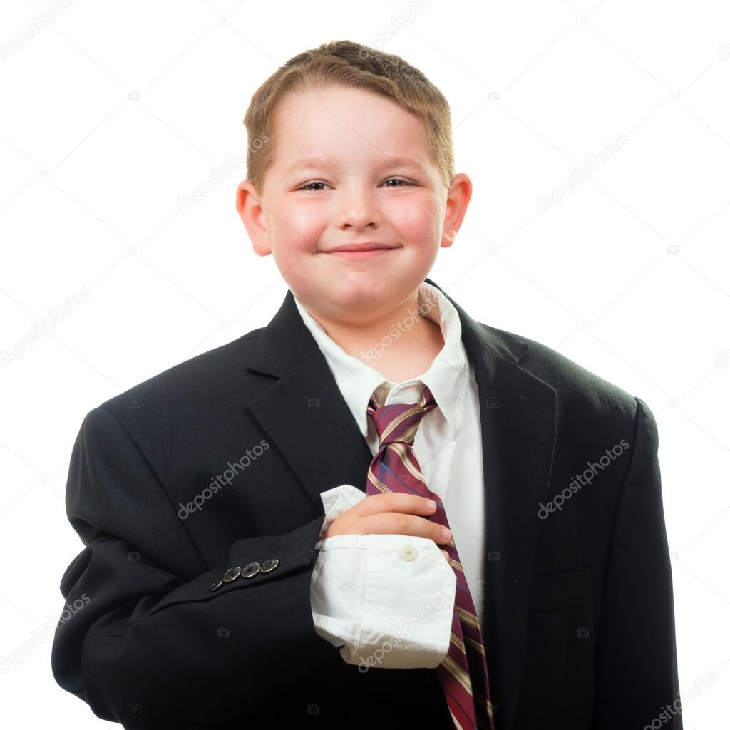 Happy child wearing suit that is too big for him