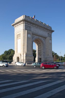 BUCHAREST, ROMANIA - AUGUST 17, 2021:  Sunset view of Arch of Triumph in city of Bucharest, Romania