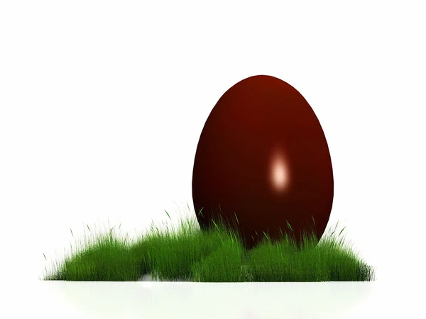 Un gran huevo de chocolate en la hierba — Foto de Stock