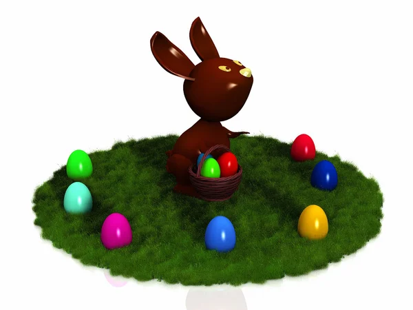 Chacolate králík s vejci v trávě — Stock fotografie
