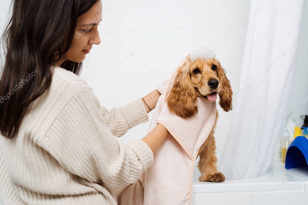 Woman with a Lovely Dog taking a bathroom