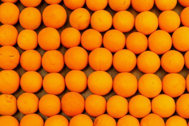 Arkaplan olarak turuncu meyveler, üst görünüm