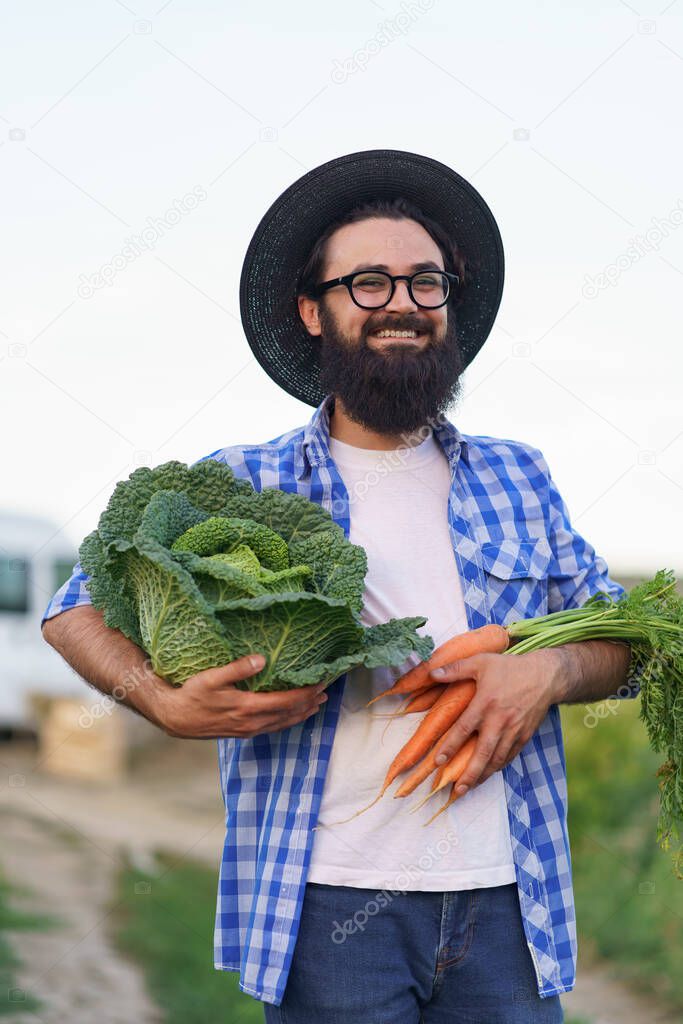 The farmer with vegetables. Autumn harvest.