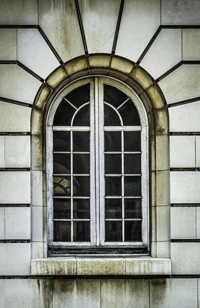 Aged arch white window — Stok fotoğraf