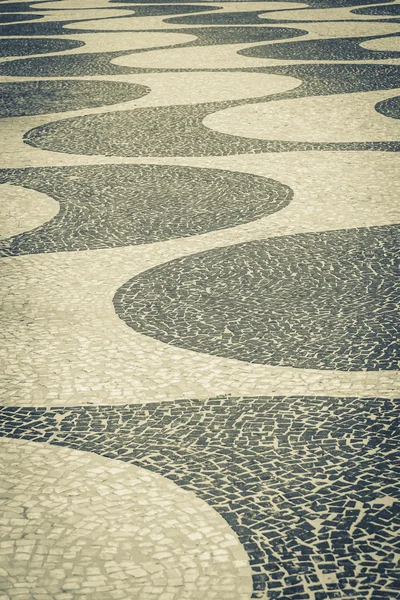 Mozaika chodníku Copacabana v rio de Janeiru — Stock fotografie