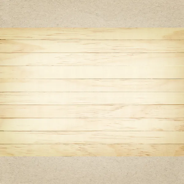 Placa de madeira sobre fundo de papelão — Fotografia de Stock
