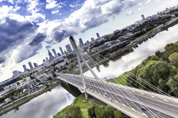 Warsaw skyline behind the bridge — Stock Photo, Image