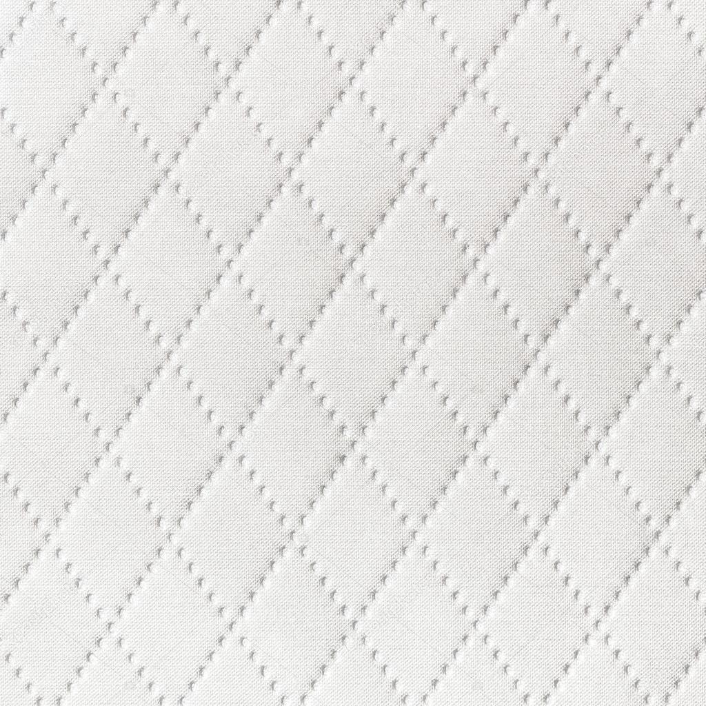 Background of textile texture with diamond pattern decoration