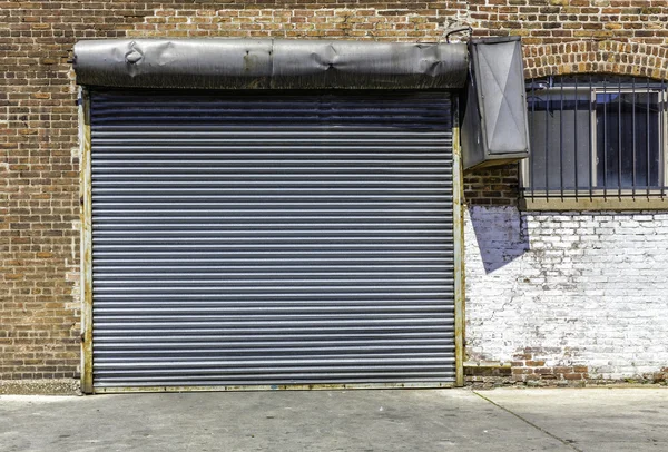 Industrial old garage door — Stock Photo, Image