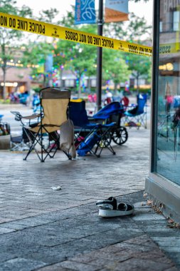 HIGHLAND PARK, ILLINOIS, UNITED STATES - JULY 4, 2022 : Highland Park deadly mass 4th of July shooting main street on July 4th, 2022