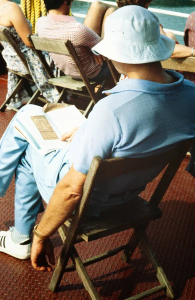 New York United States May 1970 Man Reads Book While — Stock Photo, Image