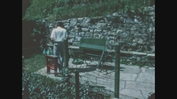 Schignano Italy June 1963 Man Takes Care His Garden 60S — Stock Video