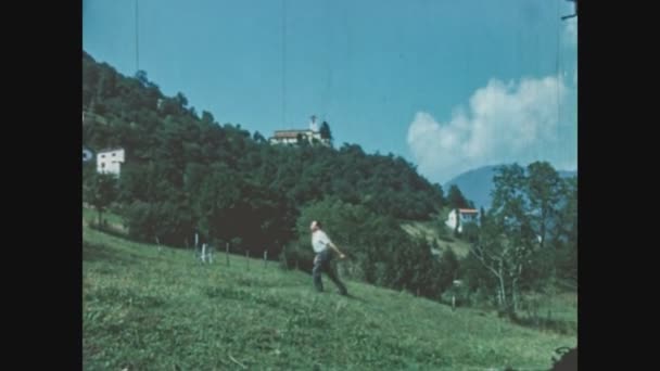 Schignano Italy June 1963 Man Walks Village 60S — Stock Video