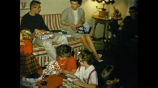 Lynn United States December 1957 Children Unwrap Christmas Presents Home — стокове відео