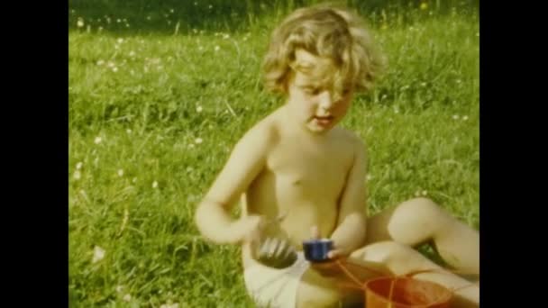 Paris France July 1958 Children Plays Toys Garden Summer 50S — Stock video