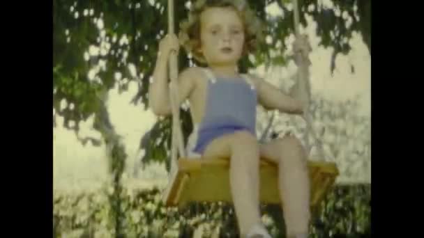 Paris France July 1958 Little Girl Swing Garden 50S — Vídeos de Stock