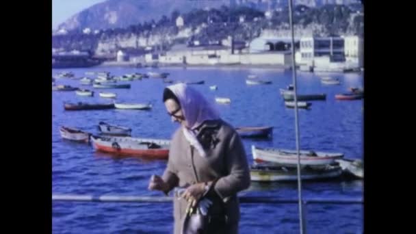 Ischia Italy June 1964 Woman Smokes Sea Port 60S — Stock Video