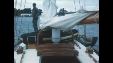 Normandy, France May 1964: Sailboat yachting vacation people scene in 60s