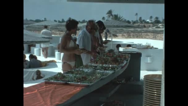 Mikonos Greece August 1981 Sea Resort Buffet People Taking Food — 图库视频影像