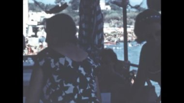 Liguria, Italy june 1960: People at restaurant on the beach scene in 60s