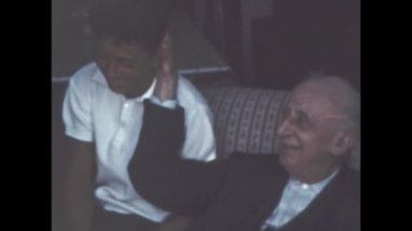 Liguria, Italy june 1960: Happy family memories at home scene in 60s