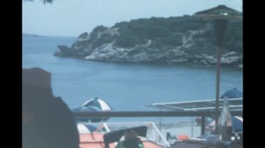 Liguria, Italy june 1960: Mediterranean beach vacation scene in 60s