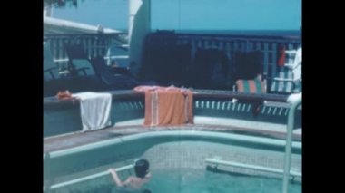 Athens, Greece june 1965: People relaxing cruise ferry vacation scene in 60s