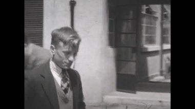 London, United Kingdom May 1939: Man dressed in suit gives away trophy in event in 30s