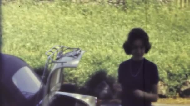 Foggia Italy April 1960 Woman Car Open Trunk Walks Meadows — Stock Video