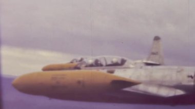 Foggia, Italy april 1960: Fighter jets in the sky - AUPC Flight school training