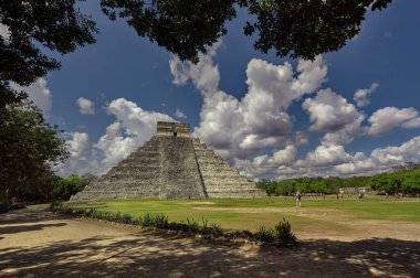 Pyramid of Chichen Itza Filtered by Vegetation in mexico