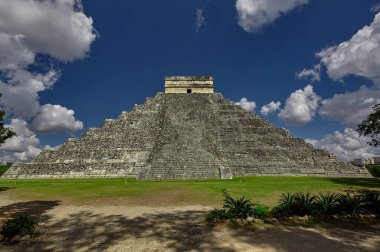 Pyramid of Chichen Itza Filtered by Vegetation in mexico