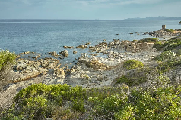 Rocks Typical Southern Coast Sardinia Italy Surrounded Sea Typical Shrub — Zdjęcie stockowe
