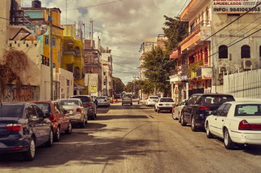 Playa del carmen, Mexico 20 august 2022: View from the center of the street of a busy street of Playa del Carmen during the sunset.