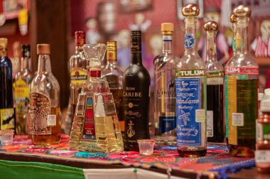 Playa del carmen, Mexico 20 august 2022: Shelves filled with various liquor bottles in a liquor shop
