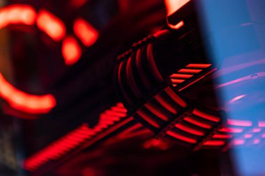 Power supply to video card by PCI-E 8 pin cable. Close up of computer graphic card on professional computer.