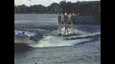 Cypress Gardens, United States june 1957: Skiers perform stunt in water ski show in 50s