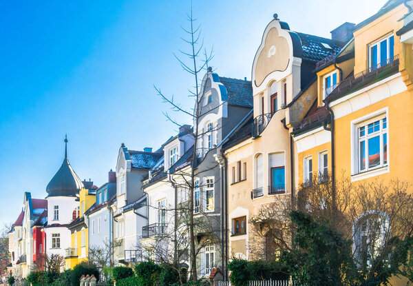 View on residential buildings of villa colony in quarter Gern - Munich. High quality photo